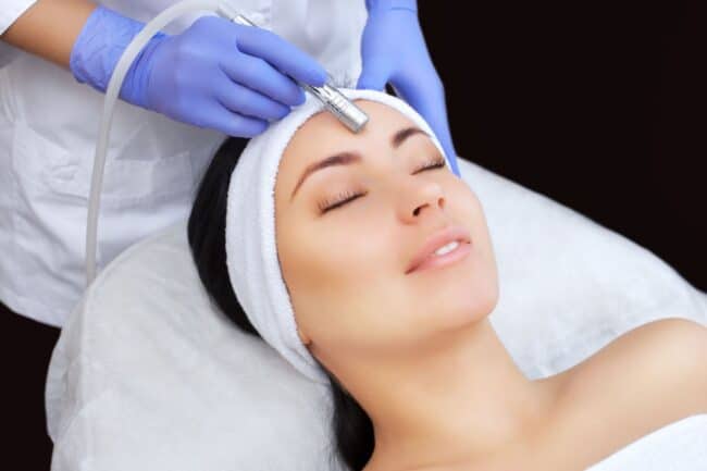 Women getting microdermabrasion